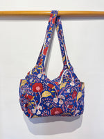 Lade das Bild in den Galerie-Viewer, Bolso Jeb flores rojas
